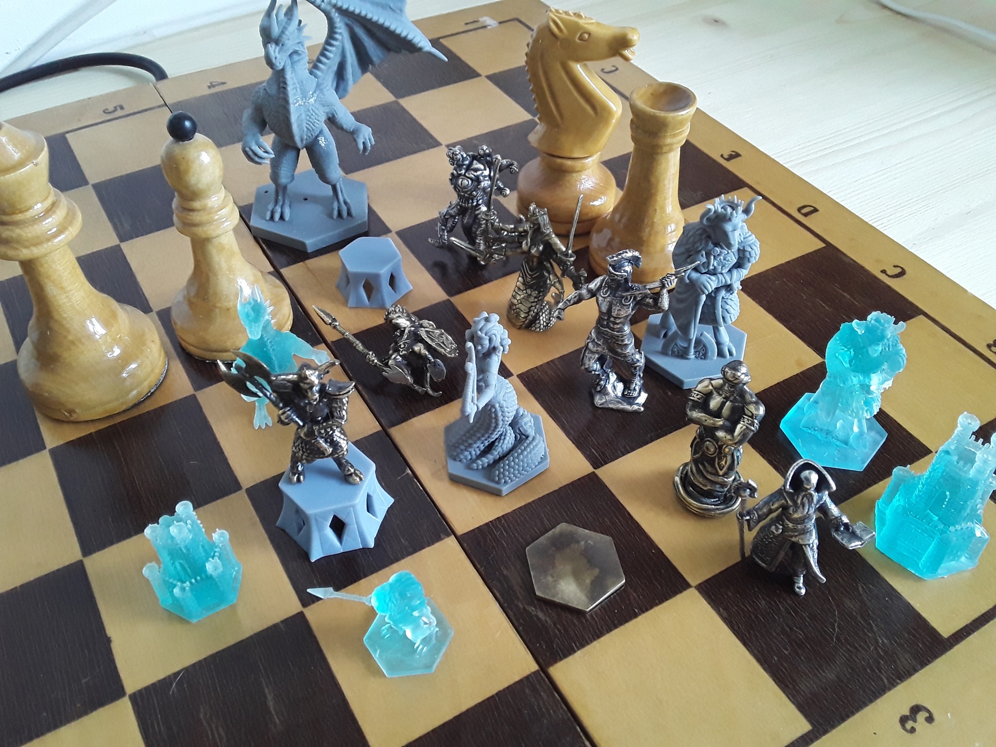 heroes chess minifigurines on chess board